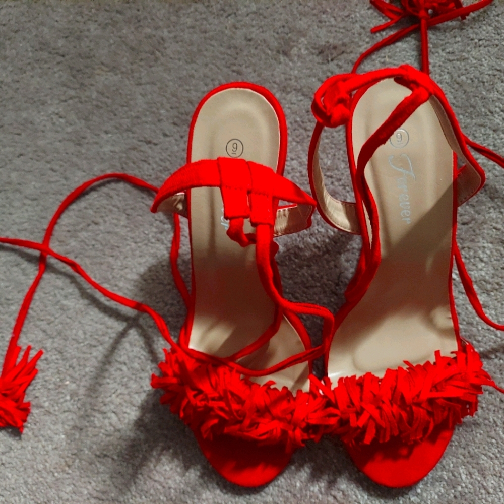 Red fringe sandal heels